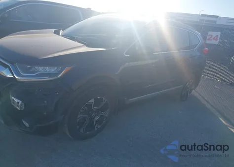 2018 Honda Cr-V Touring z USA, uszkodzony, nr VIN 7FARW1H99JE049669